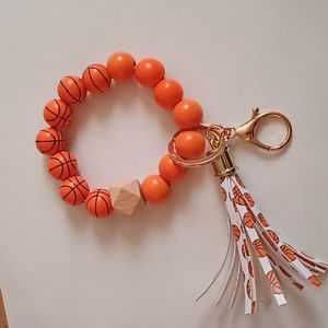 Wooden beads Basketball wristlet Keychain with tassel and clip clasp.